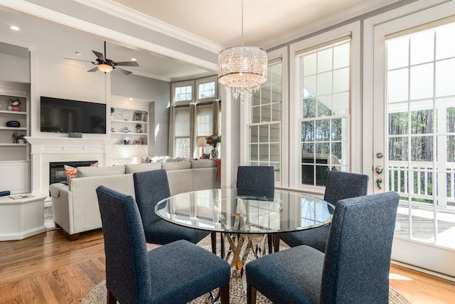 Interior of a modern home in Solano County with a round glass dining table and grey chairs